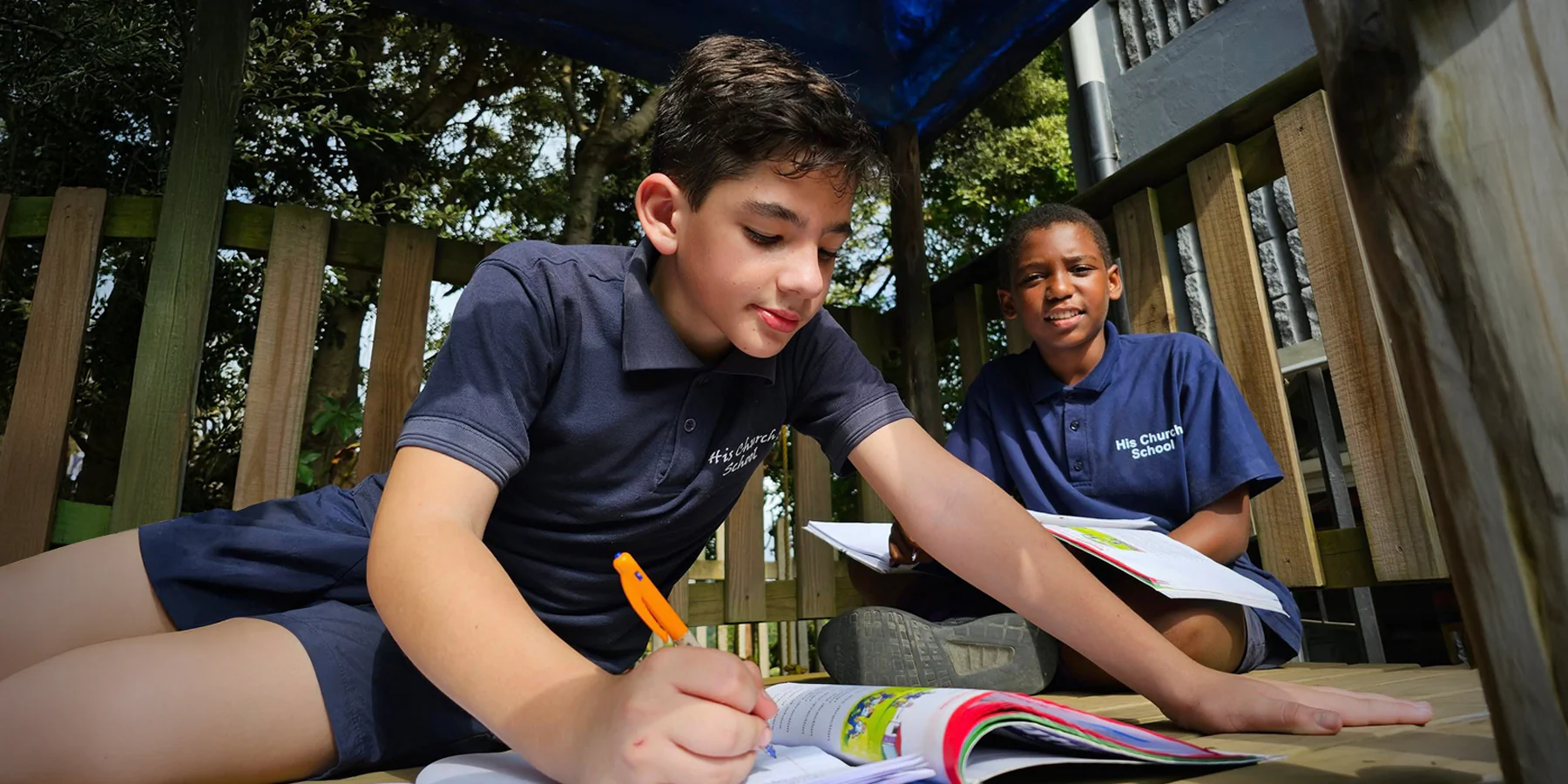 Learners working together during an academic lesson at His Church School